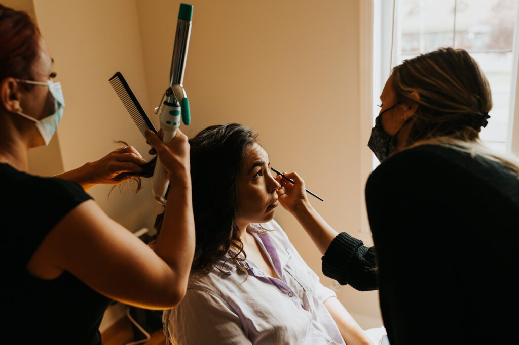 Kimberly Getting her makeup done for her wedding day at Mouton Village