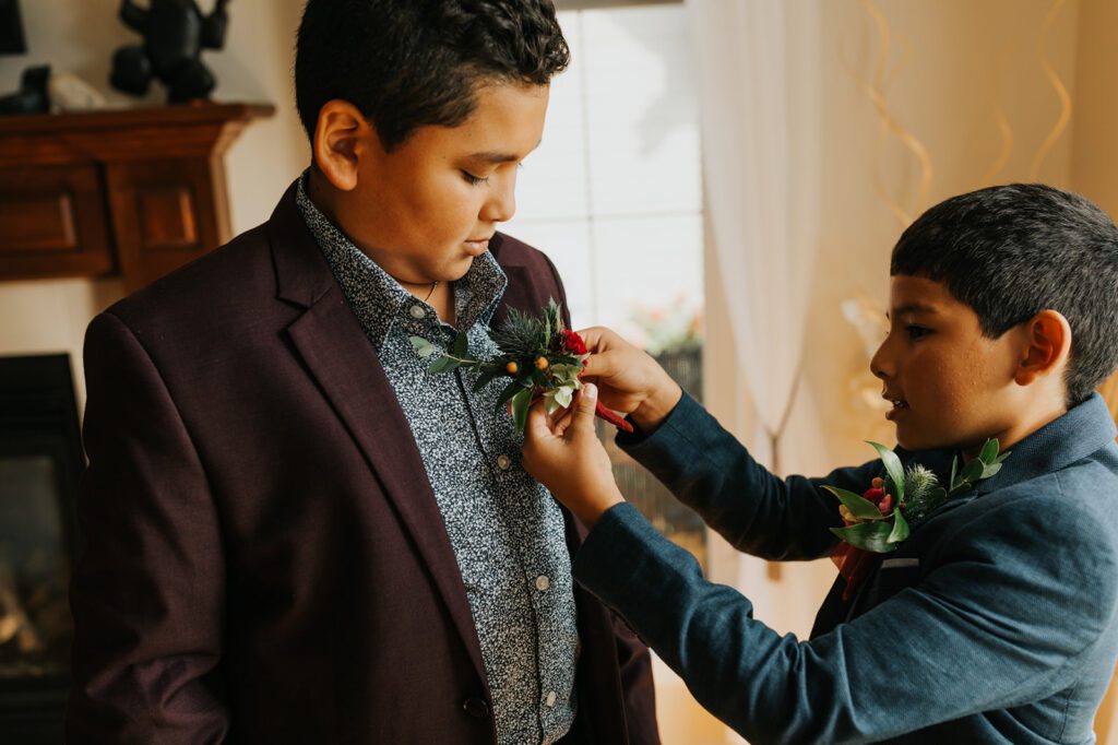 Bill's sons getting ready together for their parents' wedding at Mouton Village