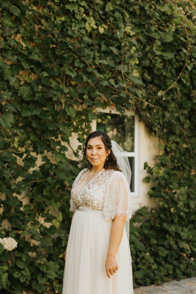 Portrait of Kimberly in her wedding dress at Mouton Village