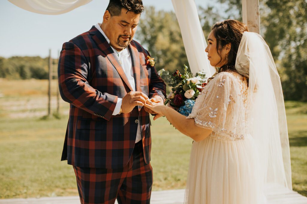 The ring exchange during the ceremony