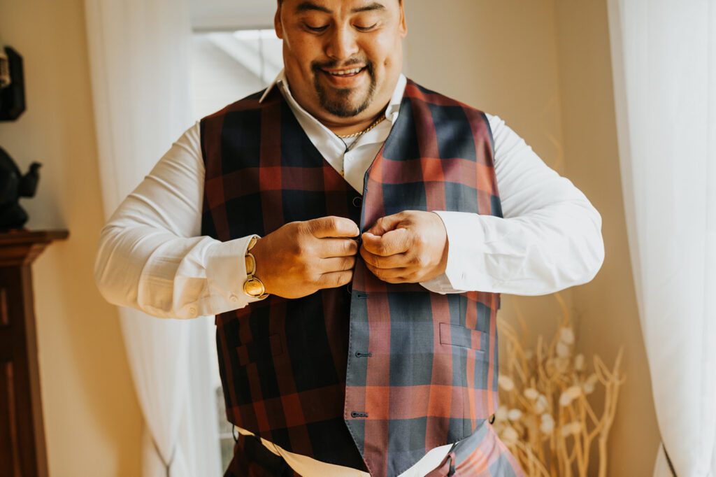 Bill getting dressed for his wedding at Mouton Village