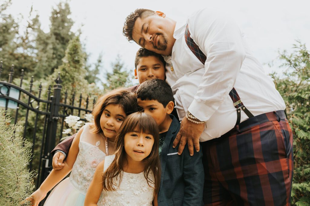 Bill with his kids before his wedding at Mouton Village