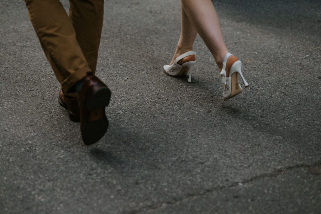 we see their feets as they walk through the streets of old montreal