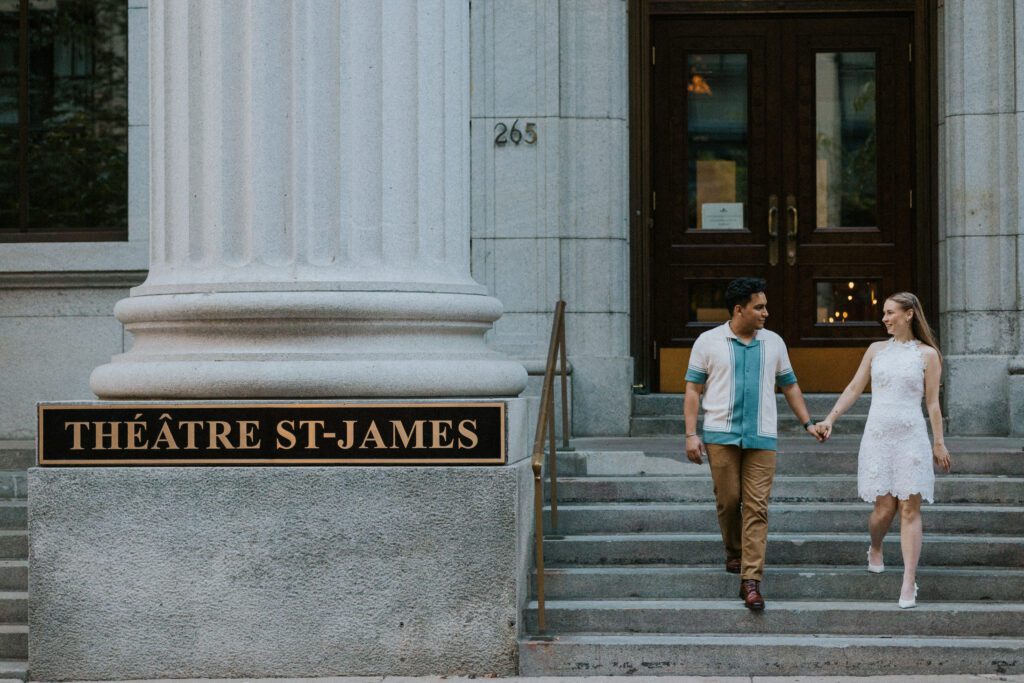 they walk down the theatre st james stairs in old montreal