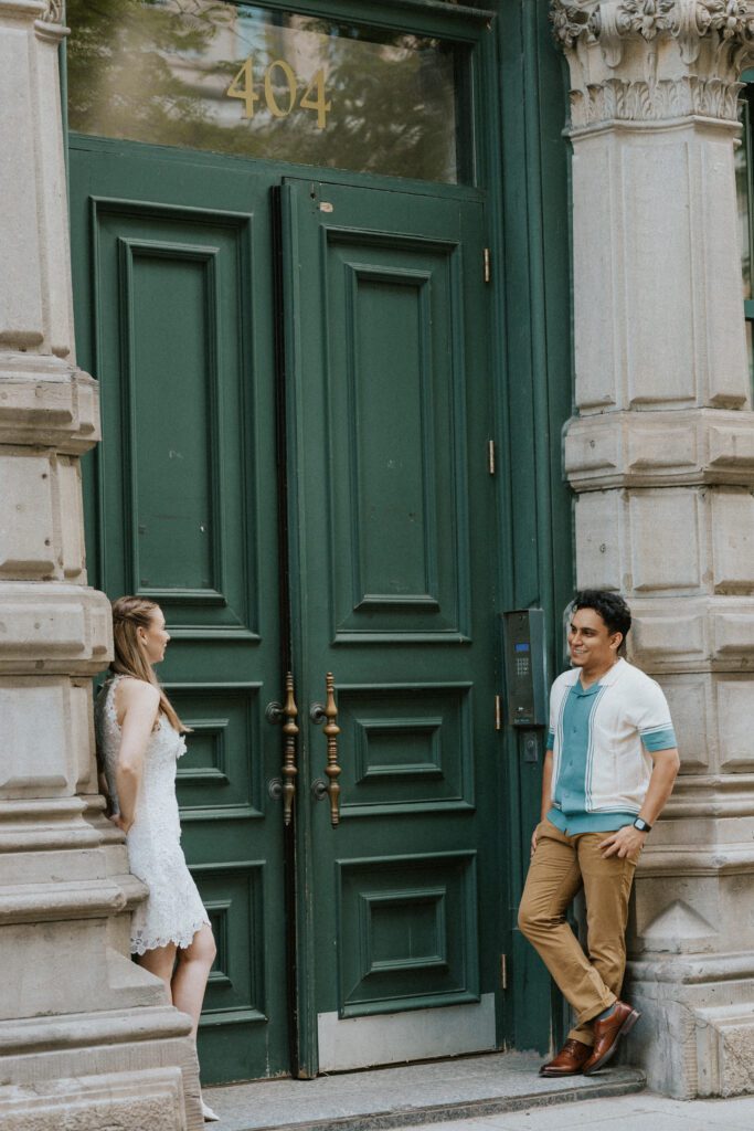 they're standing by a door in old montreal