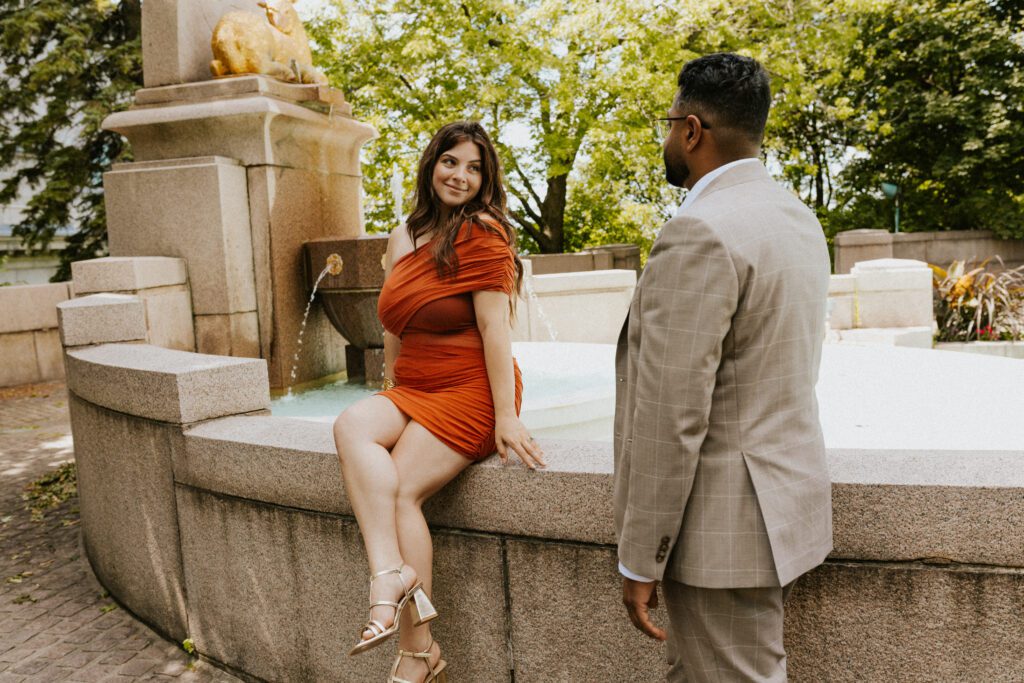he is admiring her at the fountain of the oratory